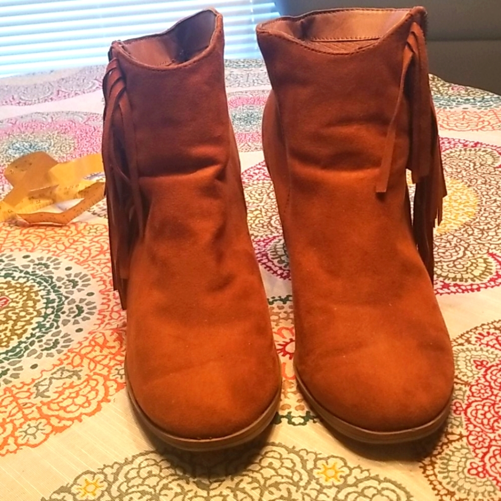 The fringe ankle boots are comfortable